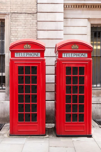 Traditional red telephone booths in London — Stock Photo, Image