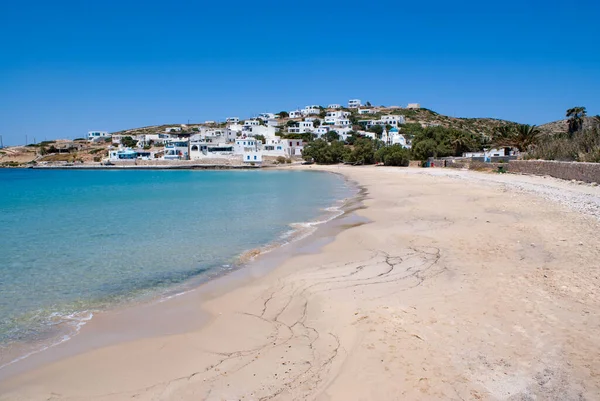 Donoussa island Greece. Charming remote holiday location, Cyclades islands.  Pristine soft sand beach with clear blue water lapping on the shore. Deserted beautiful bay. Copy space.