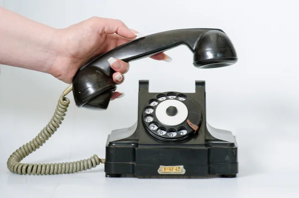 Velho telefone vintage preto isolado — Fotografia de Stock