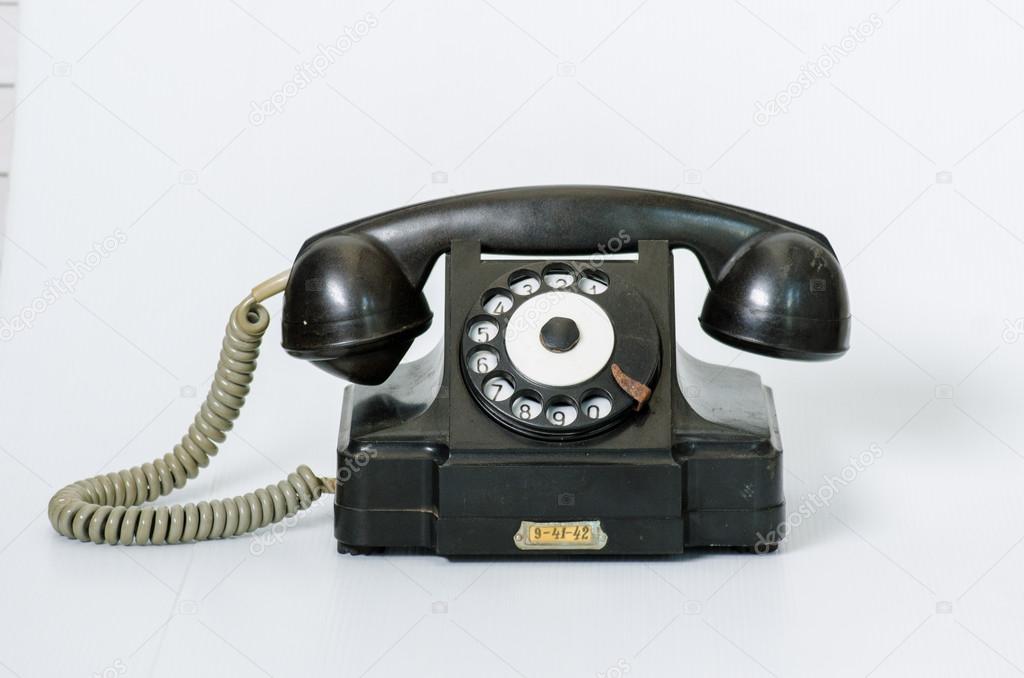 Old black vintage phone isolated
