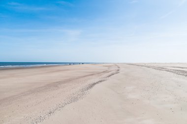 Sandy beach of Norderney clipart