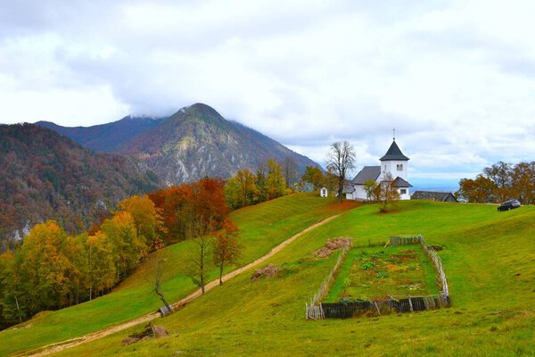 View of the church at Sveti Peter in Karavanke mountains in Gorenjska, Slovenia