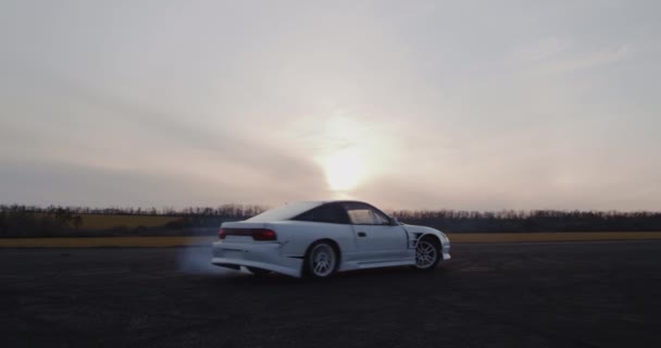 Car drifting at twilight in countryside — Stock Video