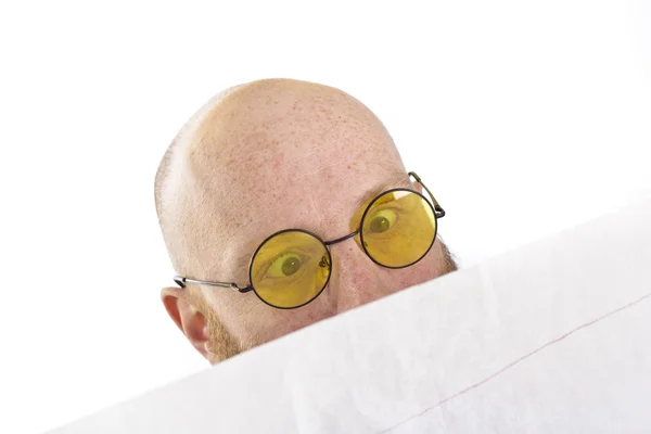 Bald man looking surprised at his work isolated on white background — Stock Photo, Image