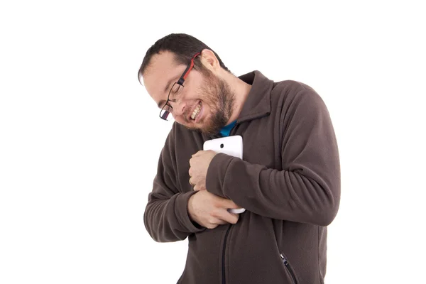 Hombre abrazando su teléfono aislado sobre fondo blanco — Foto de Stock