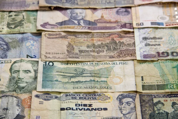 Foreign Money, money banknotes from several Asian south american countries isolated
