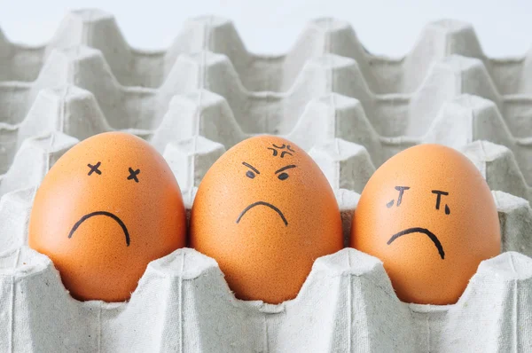 Three brown Eggs arranged in carton — Stock Photo, Image