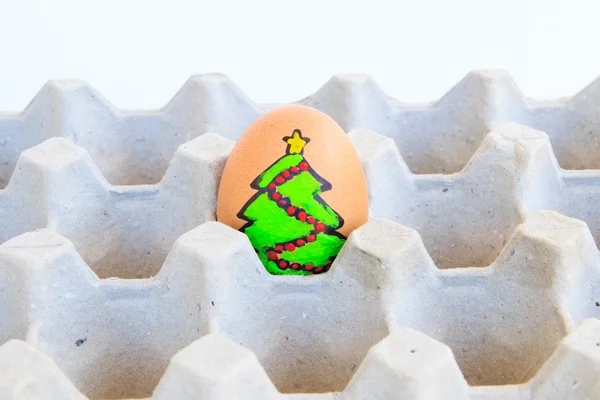 カートンに配置された描画面をもつクリスマス卵 — ストック写真