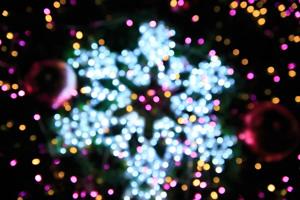 Defokussierte Weihnachten Bokeh Hintergrund am Weihnachtstag — Stockfoto