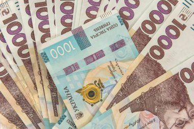 Üst görünüm arkaplanı Ukrayna 'nın yeni banknotuyla birlikte UAH. Finansal geçmiş