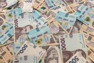 Tasarım için Ukrayna parasıyla arka plan. - Evet. Yeni banknotlar 500 ve 1000. Tasarruf kavramı