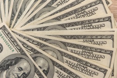 100 Amerikan doları banknot kusursuz doku ve tasarım için arka plan olarak. zenginlik tasarruf kavramı