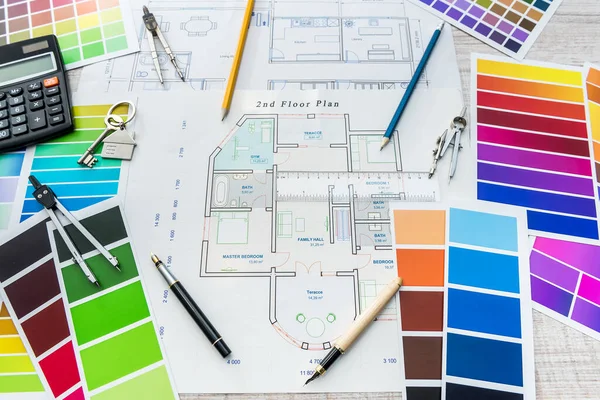 Color samples and blueprint as architecture, interior design and renovation concept. Workplace Architect. Drawing house.