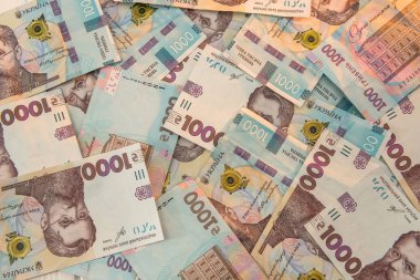 Üst görünüm arkaplanı Ukrayna 'nın yeni banknotuyla birlikte UAH. Finansal geçmiş