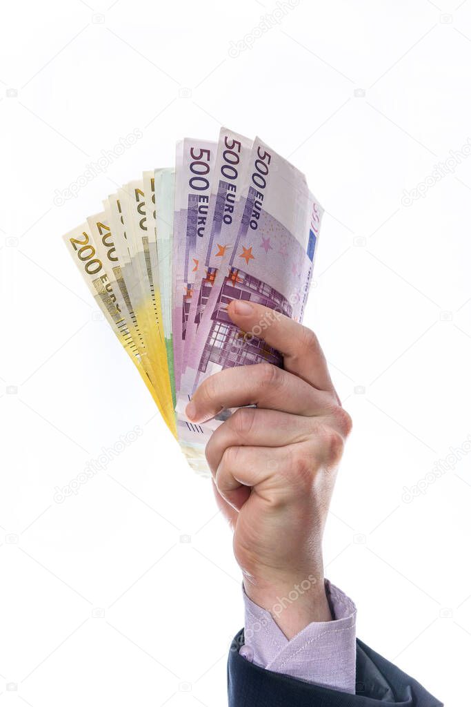 Man hand hold or given money isolated on white background. Euro currency with 500 and 200  euro bank notes