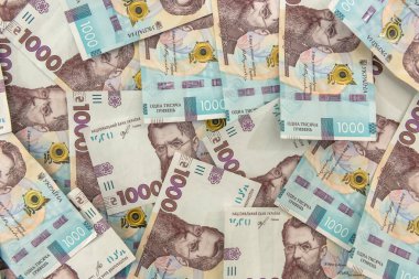 Üst görünüm arkaplanı Ukrayna 'nın yeni banknotuyla birlikte UAH. Finansal geçmiş