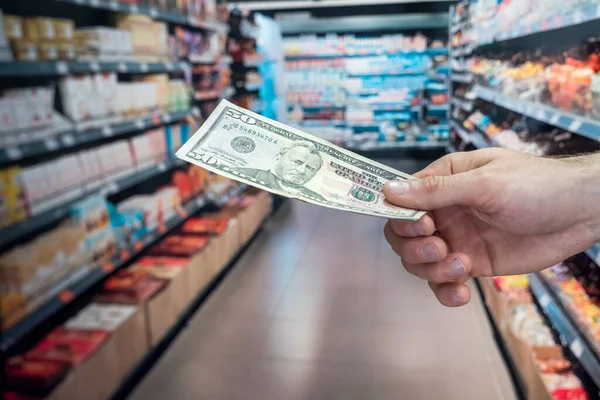 Man Holds Dollars Supermarket Purchase Concept — Stock Photo, Image