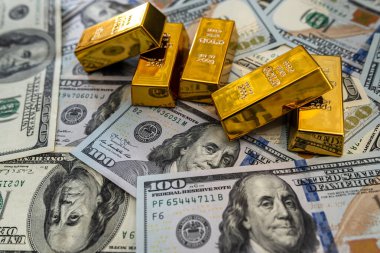 Finans konsepti dolar ve altın külçeleri. para arkaplanı