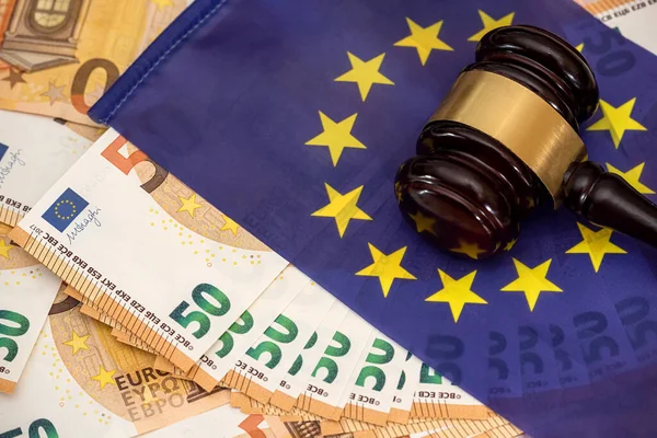 European Union Community laws gavvel bills anf flag. bribe