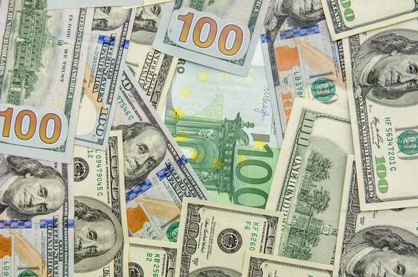 Nota de cem dólares e de euro — Fotografia de Stock