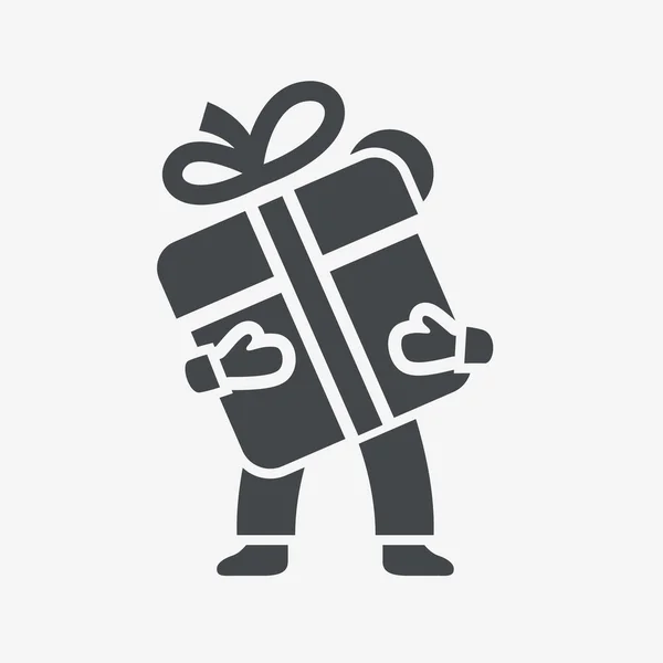 Ο άνθρωπος κατέχει ένα δώρο κουτί εικονίδιο με φιόγκο. — Διανυσματικό Αρχείο