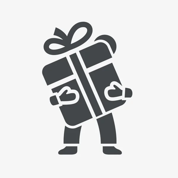 El hombre sostiene un icono de caja de regalo con arco . — Vector de stock