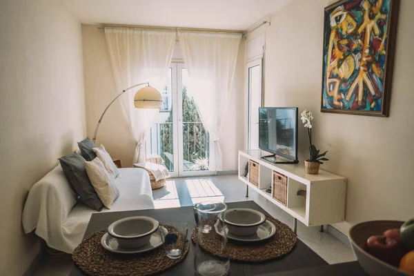 small apartment kitchen table ready for breakfast