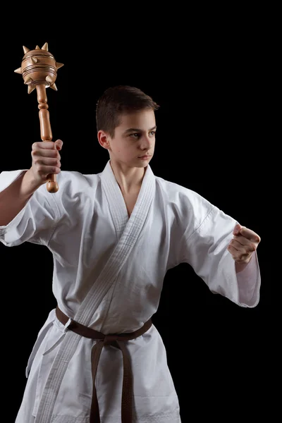 Karate harcos fehér kimonó elszigetelt fekete — Stock Fotó