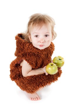 Little funny Neanderthal boy in a suit with dirty face eating an apple.  clipart