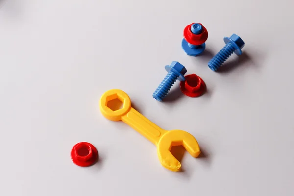 Juguetes, tornillos y tuercas de plástico —  Fotos de Stock