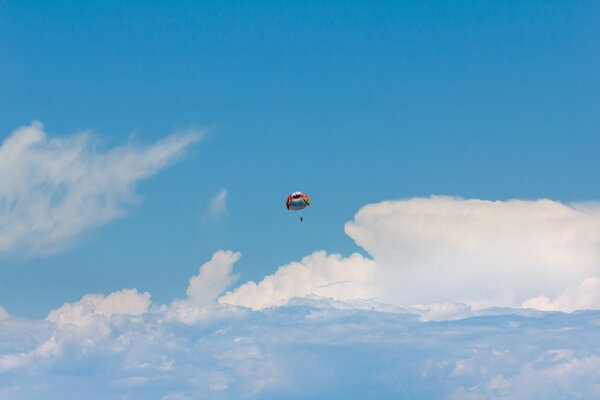 Parachuting over a sea, towing by boat