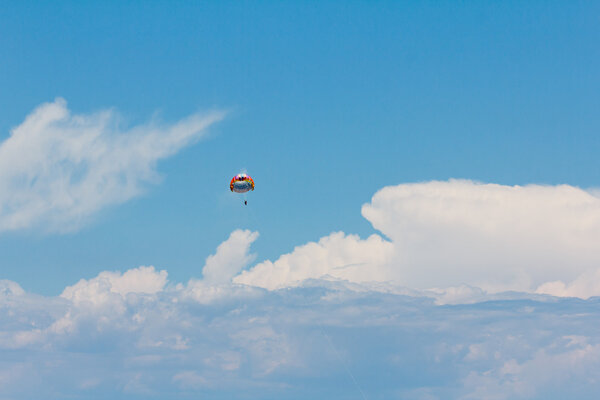 Parachuting over a sea, towing by boat