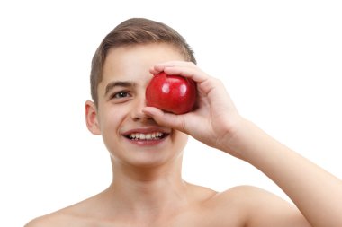 Çocuk beyaz izole Kırmızı elma ile oynarken