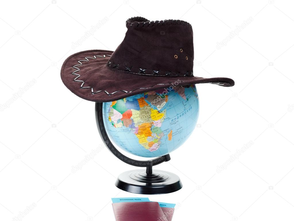 Passports, tickets, globe of the world, hat as a vacation concept. Summer journey preparation. Planning holidays, checking documents, choosing destination point, having fun.