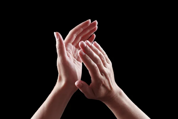 아름 다운 여성 손에 검은 배경 박수에 고립 — 스톡 사진