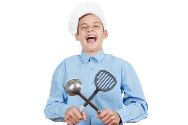 Jeune adolescent gai guffaw, rire fort et humour dans le chapeau d'un chef. Studio isolé — Photo