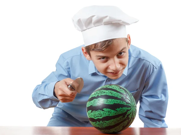Young cheerful teenager guffaw, laugh loud and humor in a chef's hat. Isolated studio — Stock Photo, Image