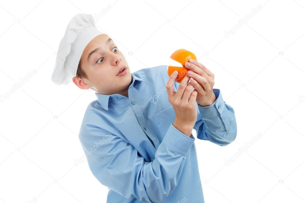 Portrait of teen Cook. On white background.