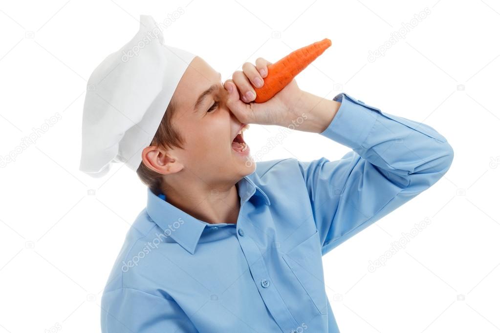 Portrait of teen Cook like Pinocchio. On white background.