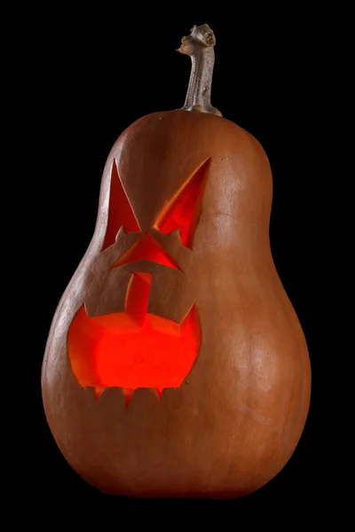 Halloween pumpkin Jack O Lantern fényes belsejében a fekete — Stock Fotó