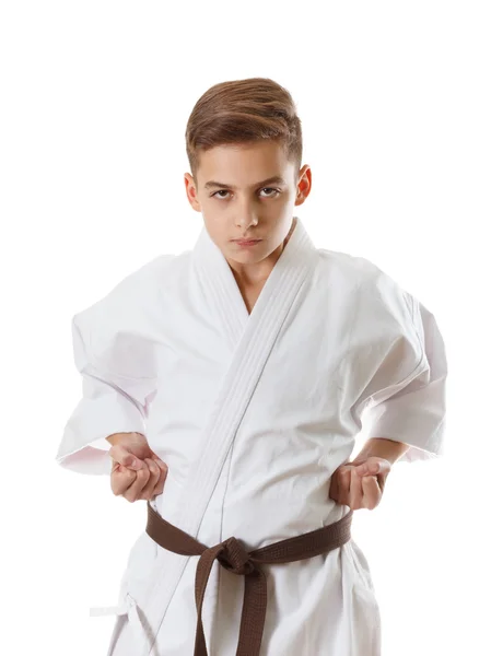 Arte marcial deporte karate niño adolescente en blanco kimono entrenamiento ponche — Foto de Stock