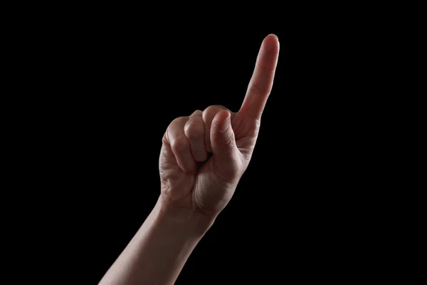 Geste, die Hand der jungen Frau zeigt die Richtung an oder berührt Geräte — Stockfoto