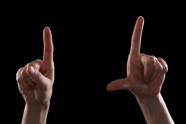 Gesto, la mano della giovane donna indica la direzione o i dispositivi di tocco — Foto Stock