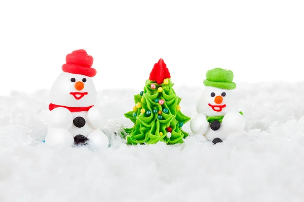 Sweet dessert snowman, snow and Christmas tree with festive decoration — 图库照片