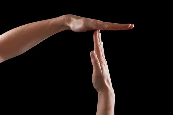 Onderbreken of pauze tijd handgebaar, schot op zwart — Stockfoto