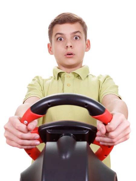 Portrait  Boy plays a driving game console, isolated on white — Stock Photo, Image