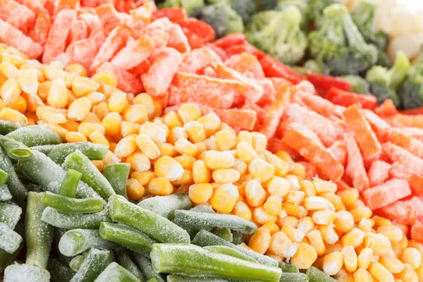 Mieszane warzywa zamrożone tle — Zdjęcie stockowe
