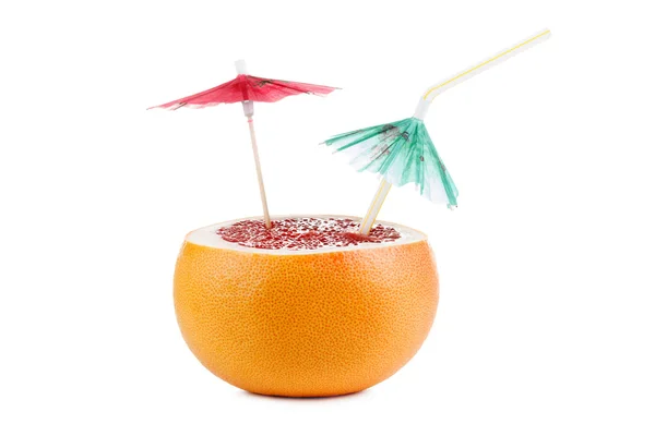 Cut grapefruit cocktail with umbrella, isolated on white — Φωτογραφία Αρχείου