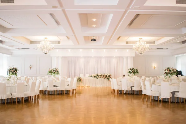 Luxury wedding decor. Wedding in white and gold colors. elegant wedding decorated with white flowers. Wedding day.