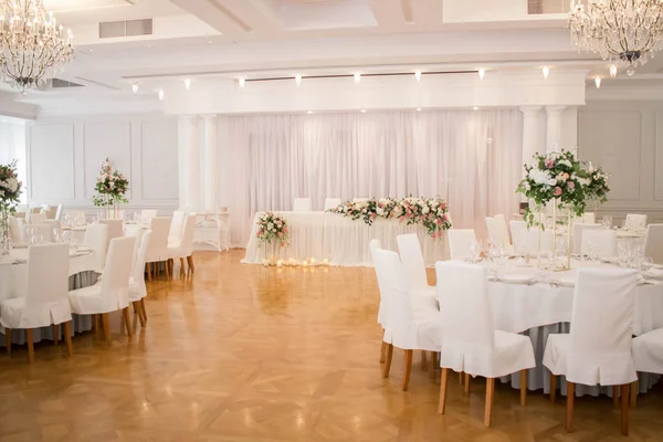 Luxury wedding decor. Wedding in white and gold colors. elegant wedding decorated with white flowers. Wedding day.